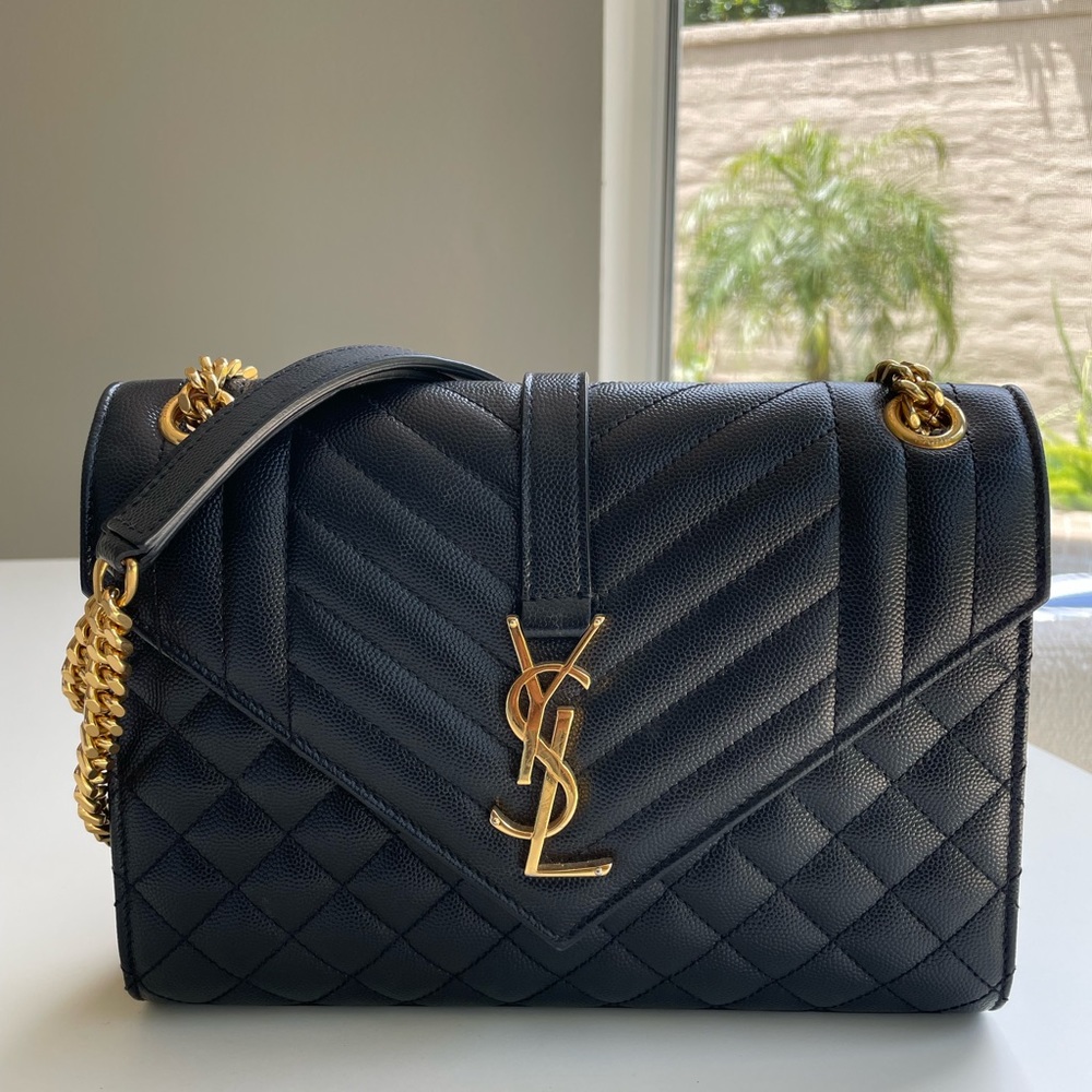 SAINT LAURENT
Medium Tri-Quilt Envelope Chain Bag in Black
